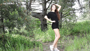 Tempting young chick Marina playing with herself in the forest