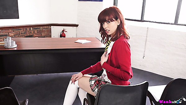This redhead is one nasty coed who wants to have some fun in the lecture room