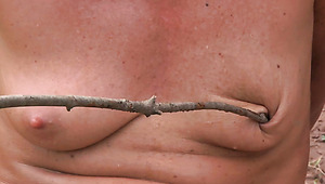 Skanky red-haired bitch gets her worn out small tits poked with a rod