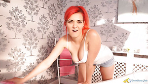 Awesome juicy boobies of redhead Dolly get flashed as she sets blanket