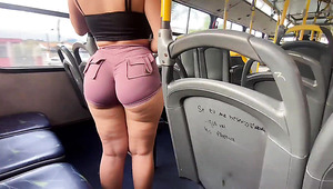 Redhead gets so horny she rubs her slick pussy on the public bus